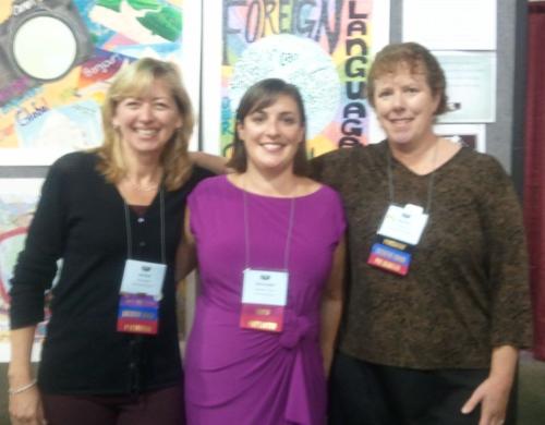 Nicole Sherf with MA Teacher of the Year, Kathleen Turner, a French teacher from Sharon, and MaFLA President Tiesa Graf, at the Advocacy Booth in the Exhibit Hall