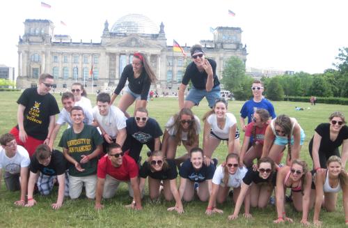 American students building a pyramid in front of the Reichstag, Berlin