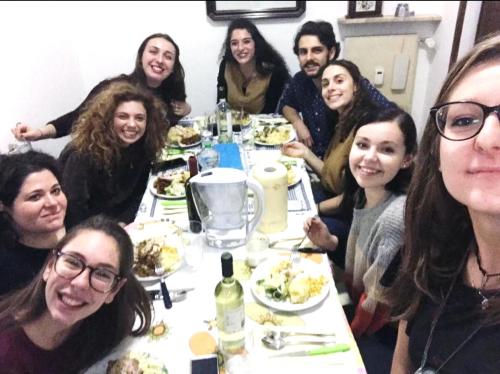 Samantha Sullivan (second on the right) and colleagues enjoy a meal in Italy